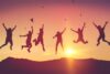 People jumping at sunset